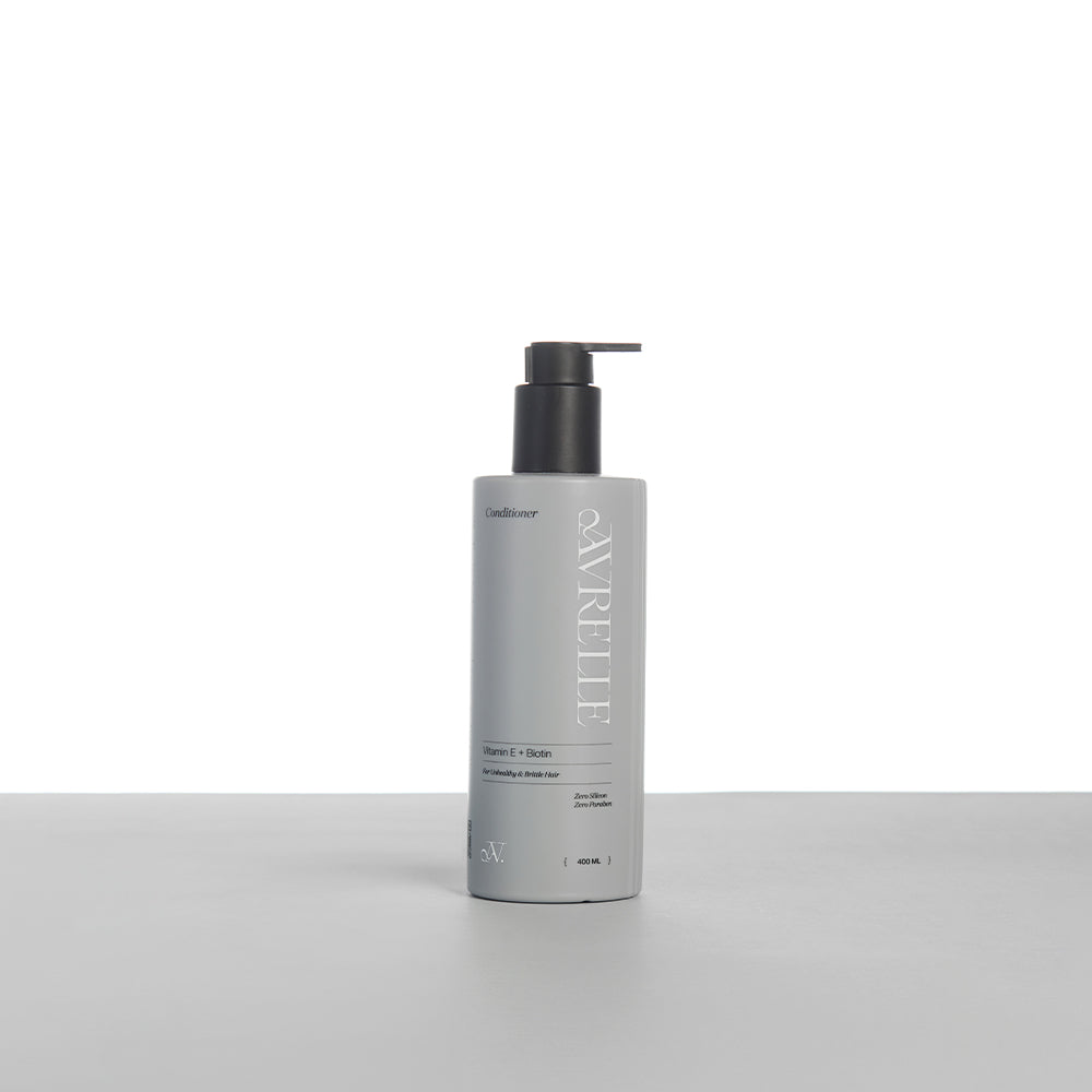 VITAMIN E OIL + BIOTIN MOISTURIZING CONDITIONER FOR UNHEALTHY AND BRITTLE HAIR